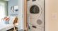 stacked washer and dryer in a closet