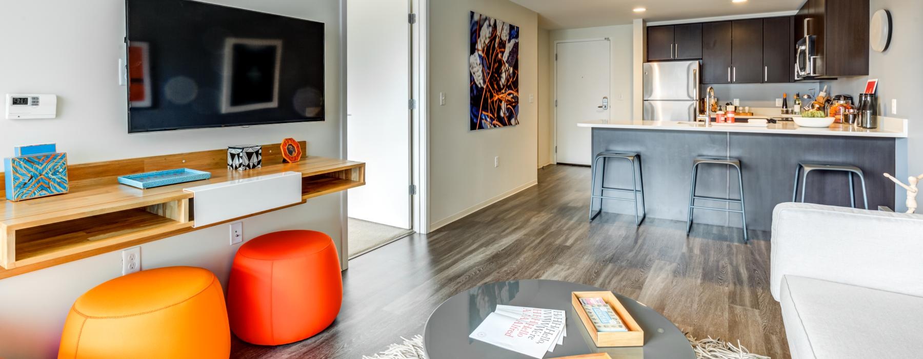 a living room with a tv and a table
