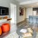 a living room with a tv and a table