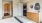 a room with a bed and private bathroom