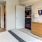 a room with a bed and private bathroom